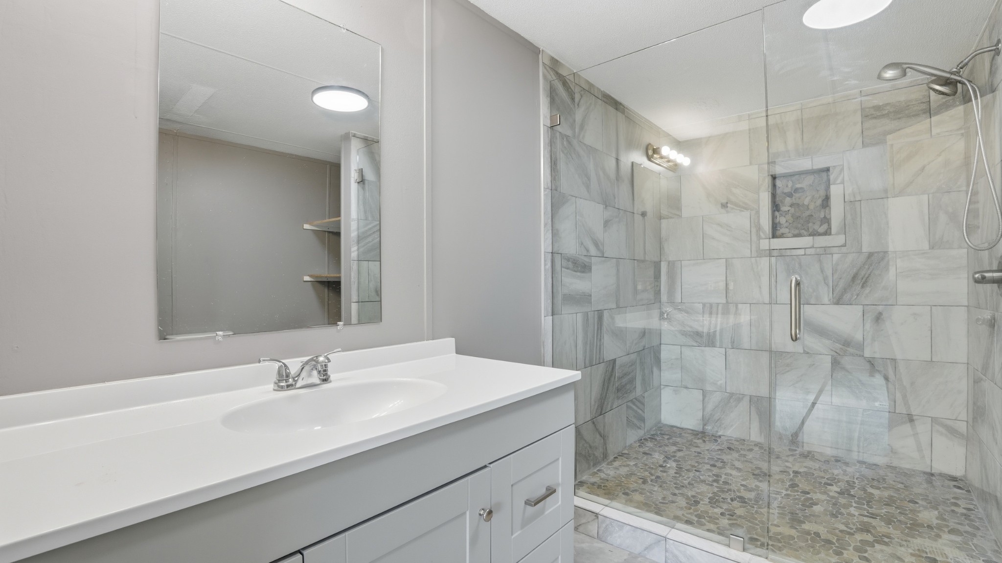 5425 Awalt Road Tullahoma, TN 37388 - Photo 14 of 33 a bathroom with a sink shower and a mirror