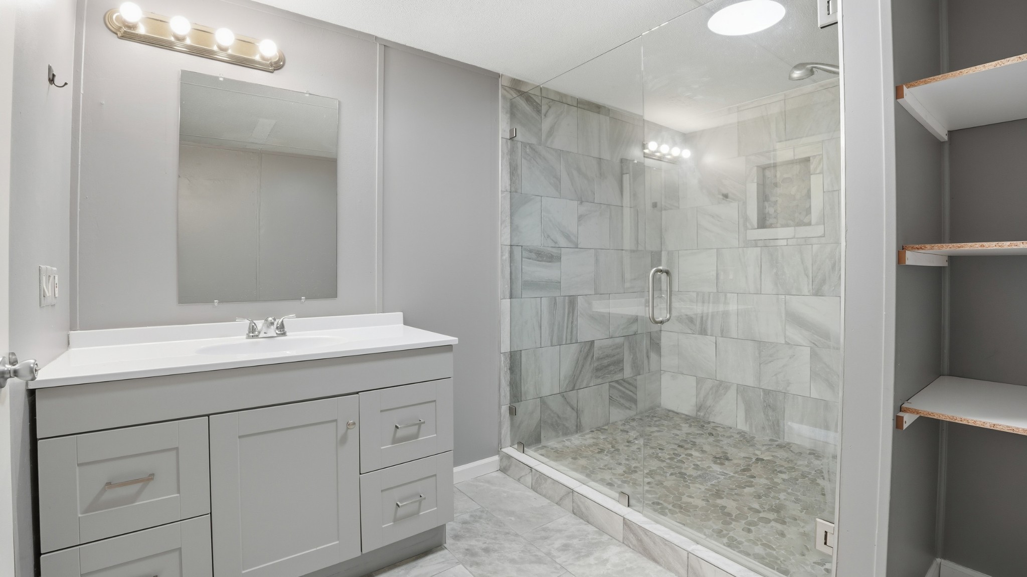 5425 Awalt Road Tullahoma, TN 37388 - Photo 15 of 33 a bathroom with a shower sink and mirror