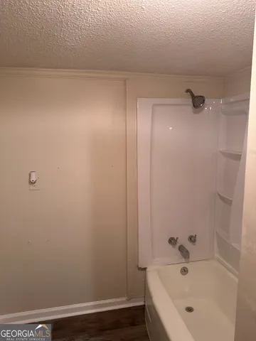 a bathroom with a bathtub