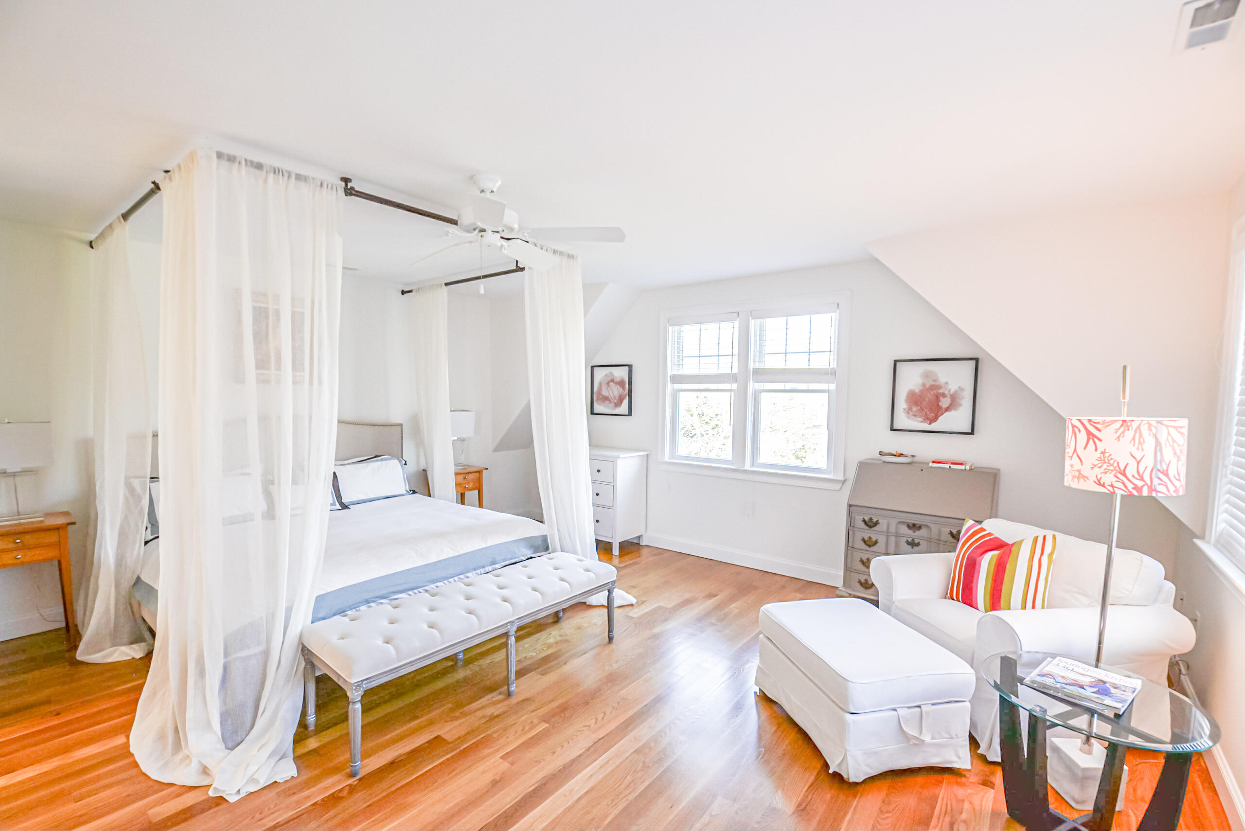 53 Rd To The Plaines Edgartown, MA 02539 - Photo 13 of 35 a bedroom with a bed and a table
