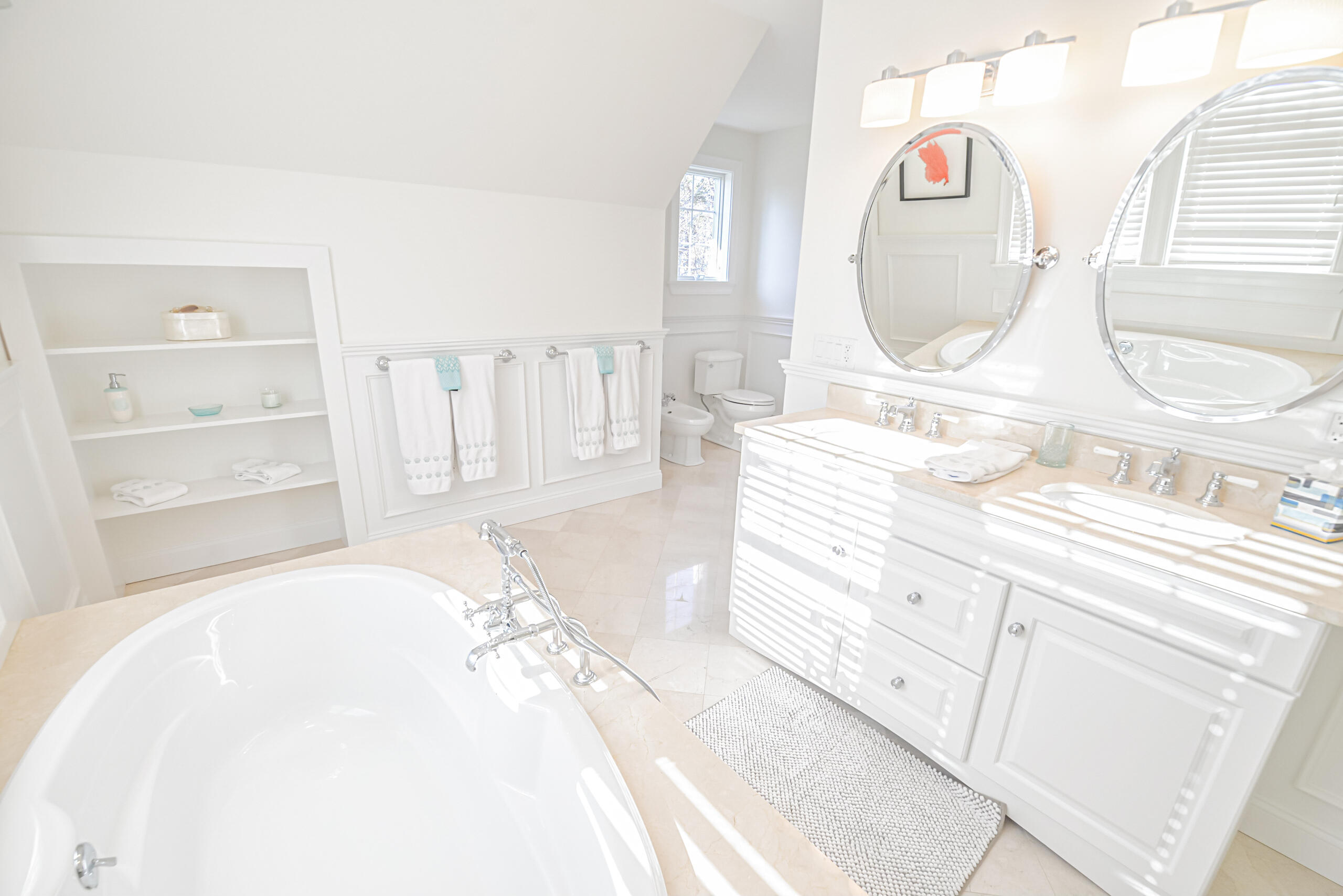 53 Rd To The Plaines Edgartown, MA 02539 - Photo 16 of 35 a spacious bathroom with a sink a mirror and a shower