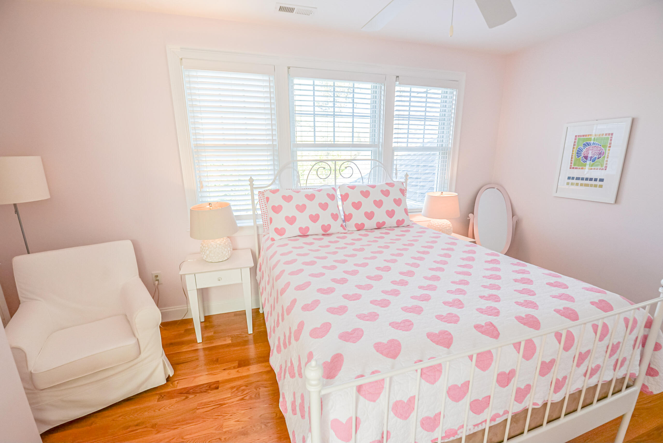 53 Rd To The Plaines Edgartown, MA 02539 - Photo 18 of 35 a bedroom with a large bed and a couch