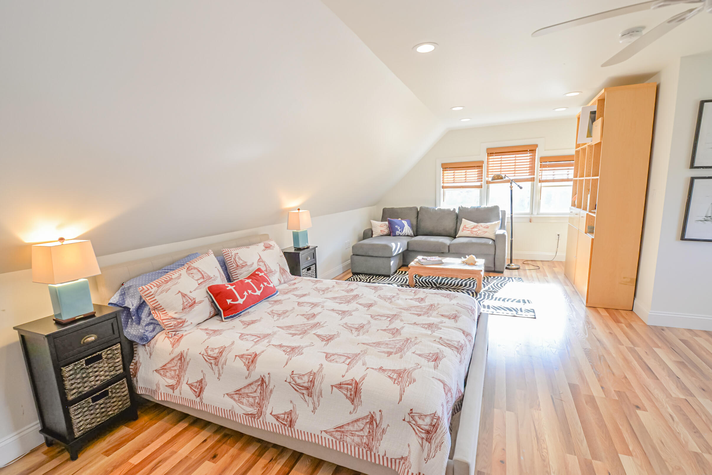 53 Rd To The Plaines Edgartown, MA 02539 - Photo 24 of 35 a bedroom with a bed and wooden floor