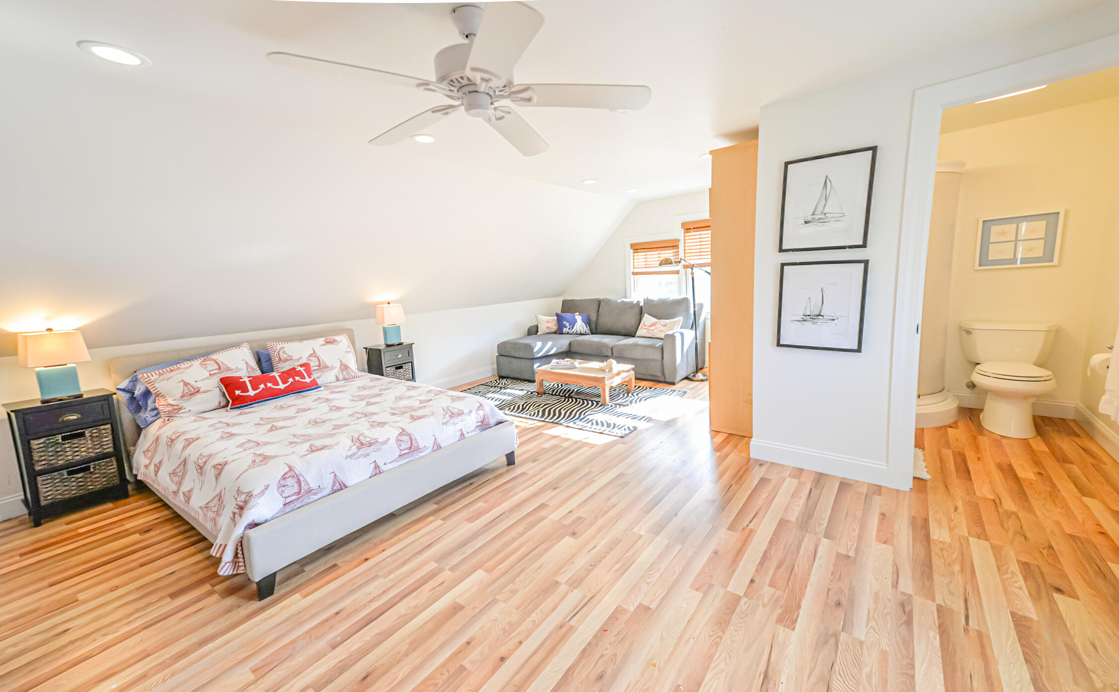 53 Rd To The Plaines Edgartown, MA 02539 - Photo 25 of 35 a bedroom with a bed and wooden floor