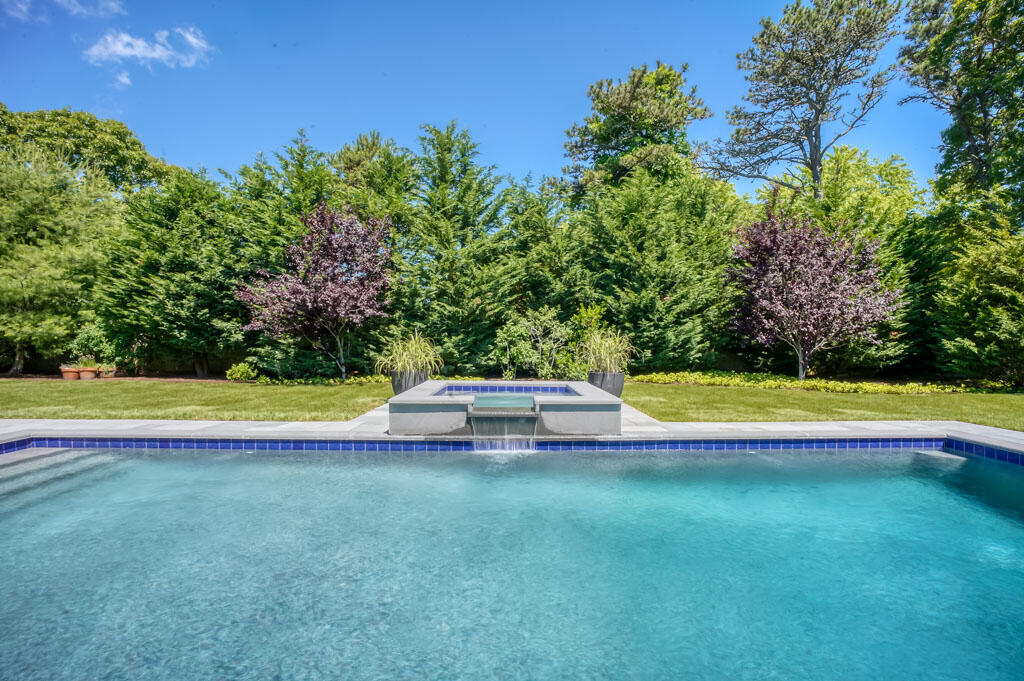 53 Rd To The Plaines Edgartown, MA 02539 - Photo 34 of 35 a view of swimming pool with lawn chair and trees
