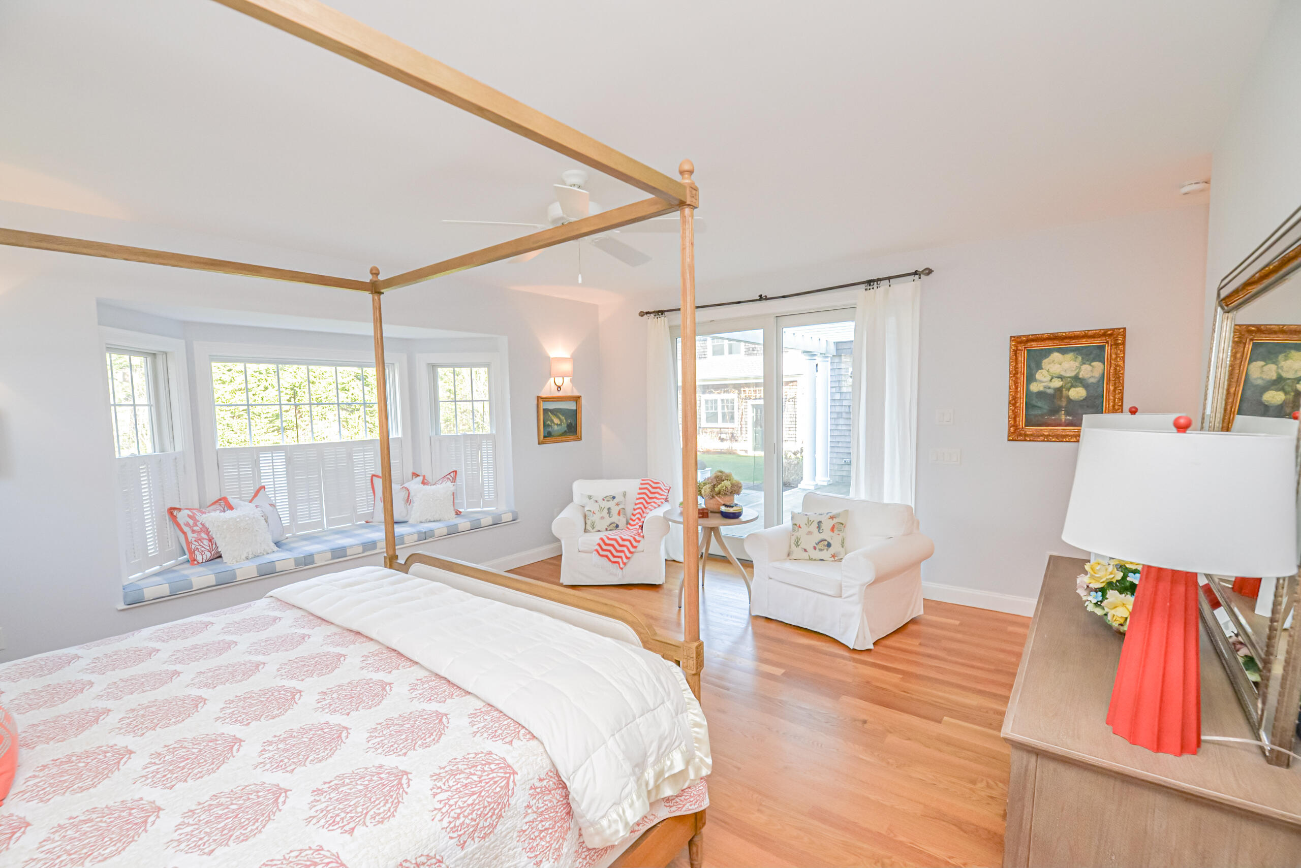 53 Rd To The Plaines Edgartown, MA 02539 - Photo 10 of 35 a bedroom with a bed and wooden floor