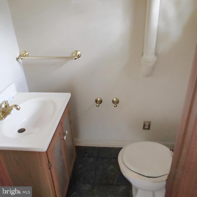 718 Mayo Road Glen Burnie, MD 21061 - Photo 20 of 48 Cozy bathroom with classic fixtures.