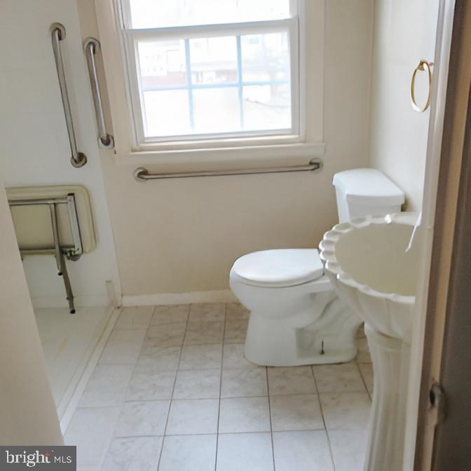 718 Mayo Road Glen Burnie, MD 21061 - Photo 37 of 48 Bright and accessible bathroom oasis.