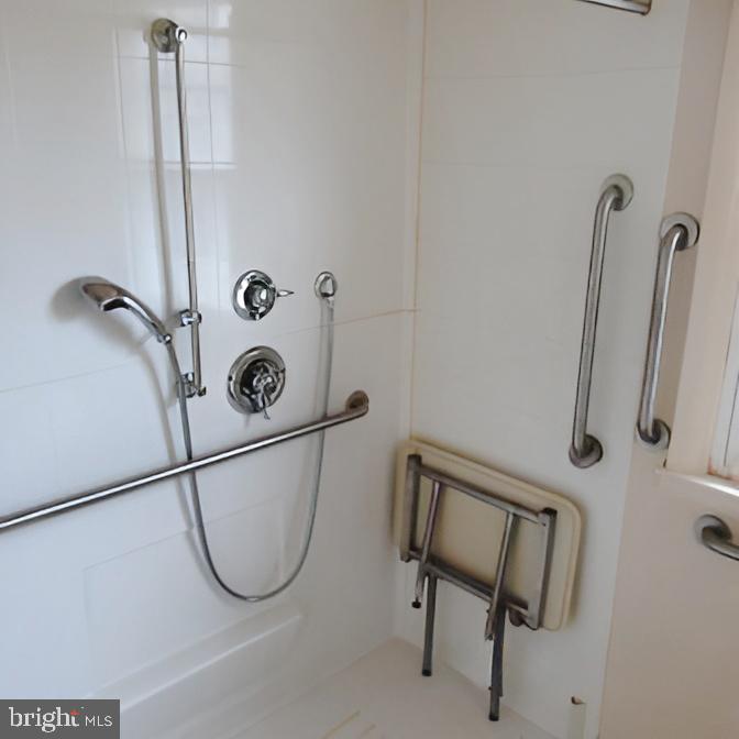718 Mayo Road Glen Burnie, MD 21061 - Photo 38 of 48 Accessible shower with modern fixtures.
