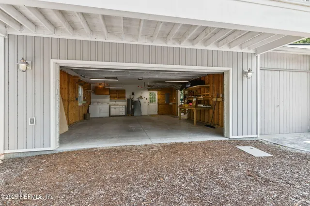 a view of a livingroom with furniture and window