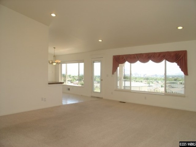 3100 Coronado Way Reno, NV 89503 - Photo 4 of 9 a view of an empty room with a window