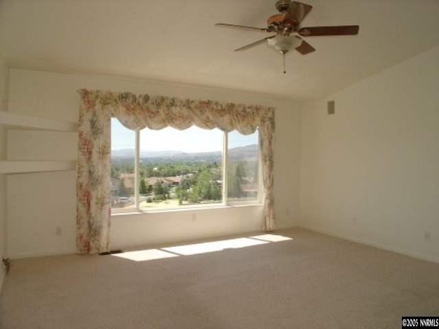 3100 Coronado Way Reno, NV 89503 - Photo 5 of 9 an empty room with a window
