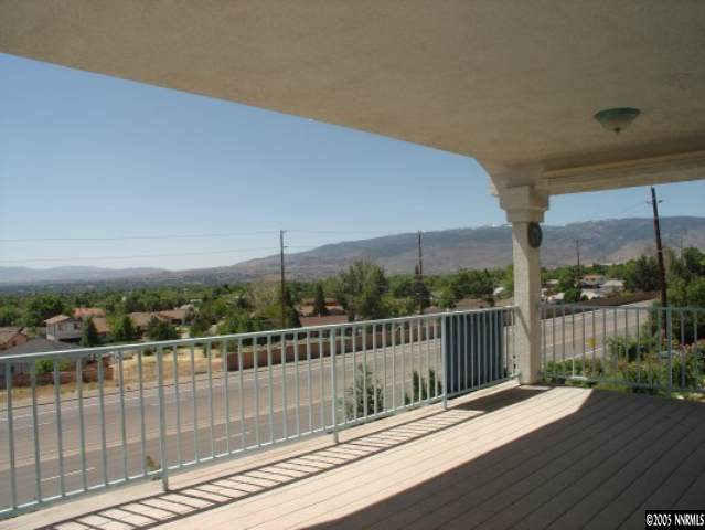 3100 Coronado Way Reno, NV 89503 - Photo 8 of 9 a view of a balcony with wooden floor