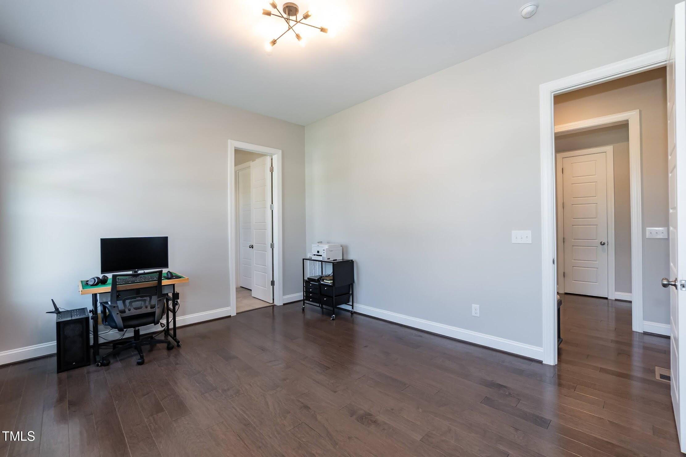 536 Adkins Ridge Road Rolesville, NC 27571 - Photo 35 of 52 a view of room with a flat screen tv and piano