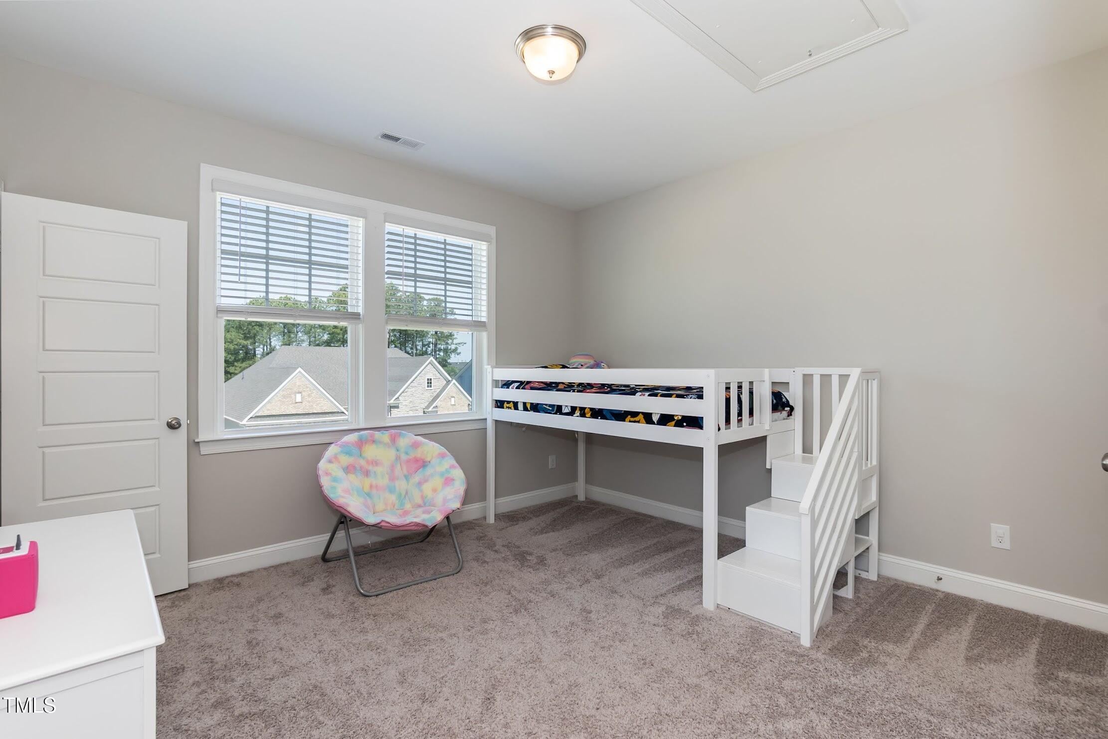 536 Adkins Ridge Road Rolesville, NC 27571 - Photo 45 of 52 a living room with furniture and a window