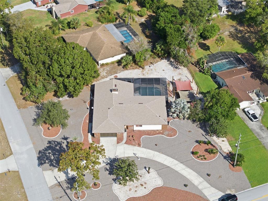 8123 River Country Drive Weeki Wachee, FL 34607 - Photo 12 of 61 an aerial view of a house with garden