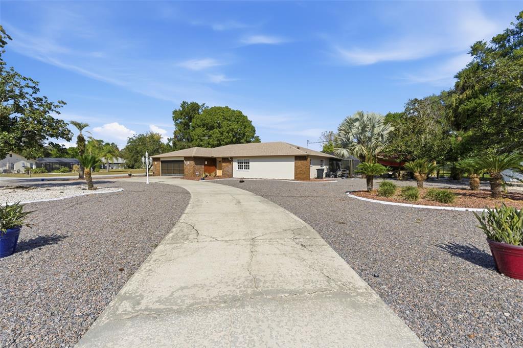 8123 River Country Drive Weeki Wachee, FL 34607 - Photo 14 of 61 a view of house with outdoor space and street view