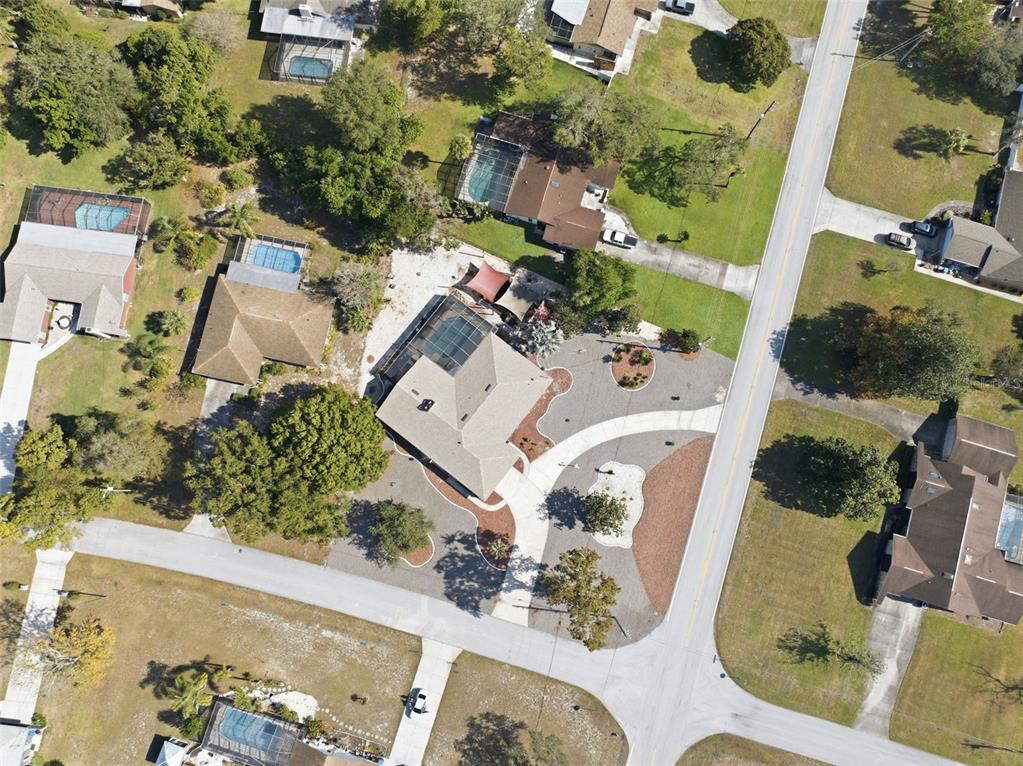 8123 River Country Drive Weeki Wachee, FL 34607 - Photo 16 of 61 an aerial view of a house with a yard