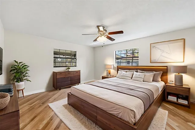 a living room with stainless steel appliances kitchen island granite countertop furniture and a fireplace
