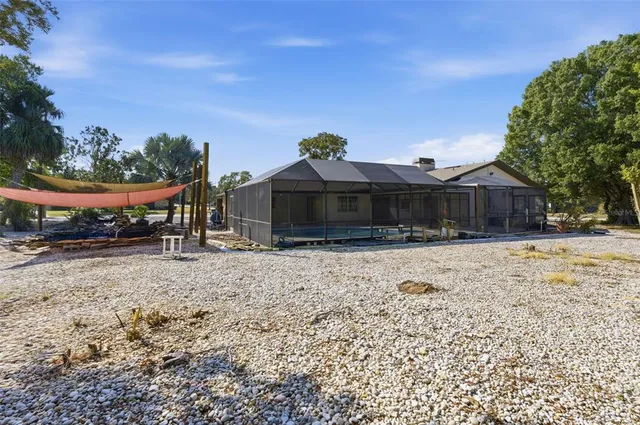 an aerial view of a house with garden