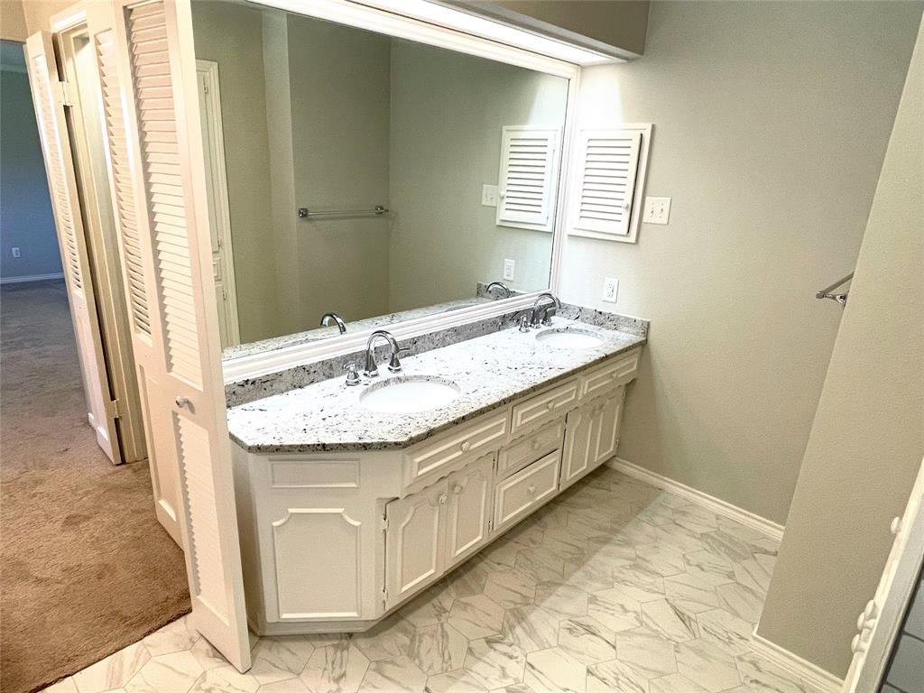 4847 Twin Post Road Dallas, TX 75244 - Photo 17 of 36 Primary Ensuite Bathroom featuring vanity