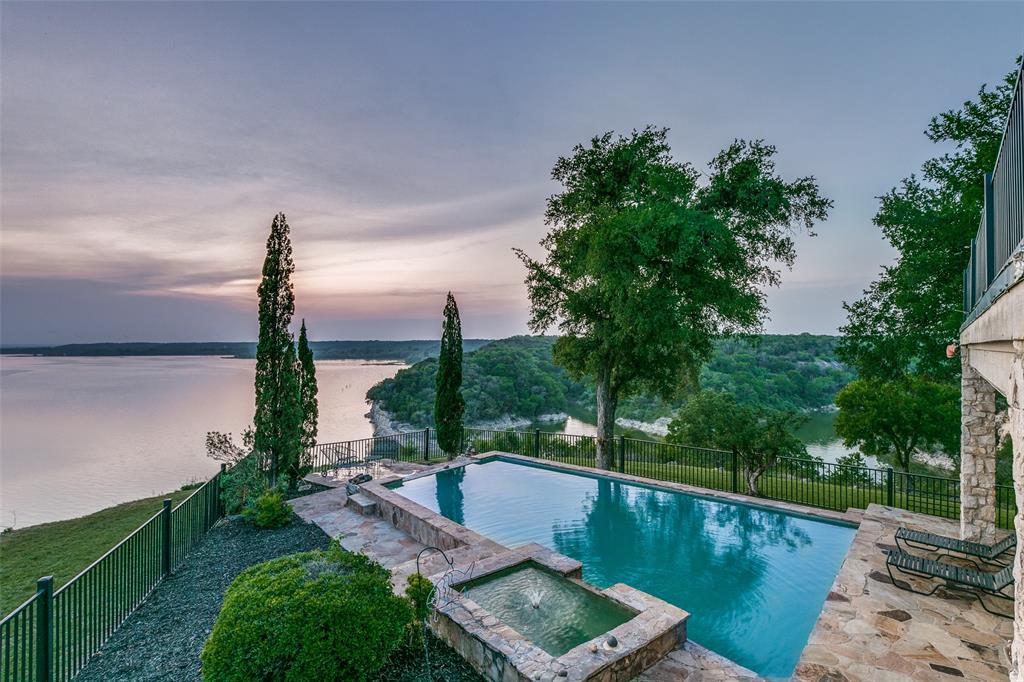 1237 Overlook Court Whitney, TX 76692 - Photo 21 of 39 a view of a water pond with green yard