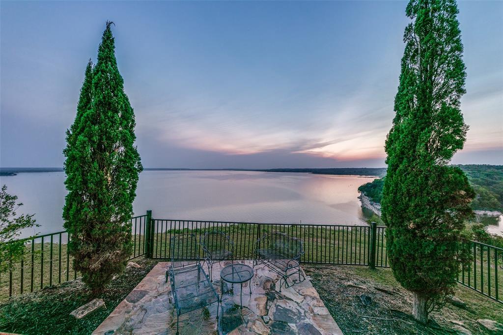 1237 Overlook Court Whitney, TX 76692 - Photo 23 of 39 a view of a garden with a pathway