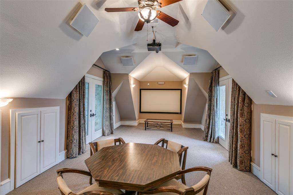 1237 Overlook Court Whitney, TX 76692 - Photo 38 of 39 a room with table chairs and wooden floor