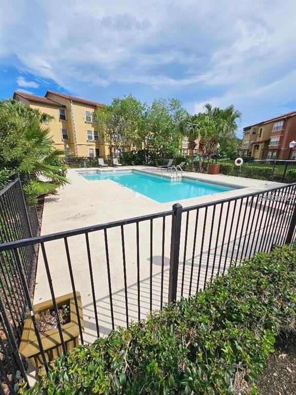 5132 Conroy Road, Unit 932 Orlando, FL 32811 - Photo 12 of 19 a view of a street view from a balcony