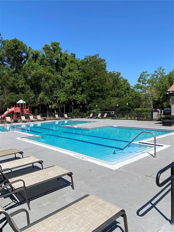 5132 Conroy Road, Unit 932 Orlando, FL 32811 - Photo 13 of 19 a view of a tennis court