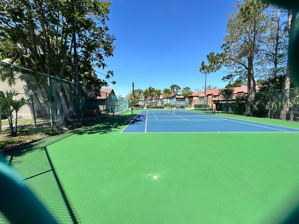 5132 Conroy Road, Unit 932 Orlando, FL 32811 - Photo 19 of 19 a view of a park with large trees