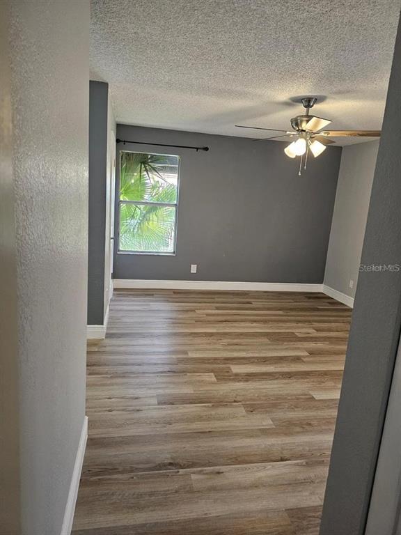 5132 Conroy Road, Unit 932 Orlando, FL 32811 - Photo 9 of 19 a view of room with window and ceiling fan