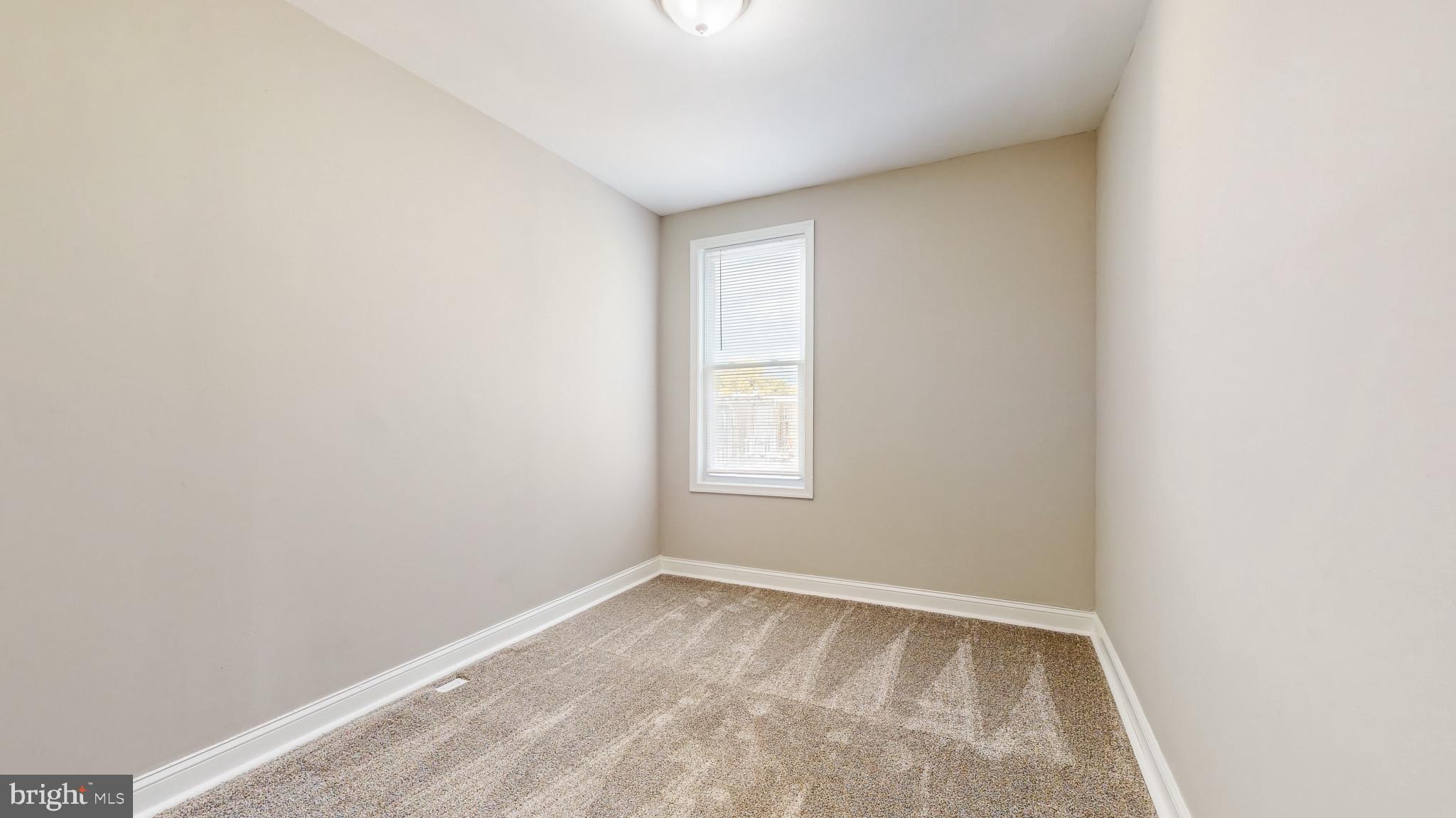 812 McCabe Avenue Baltimore, MD 21212 - Photo 12 of 18 a view of room with window