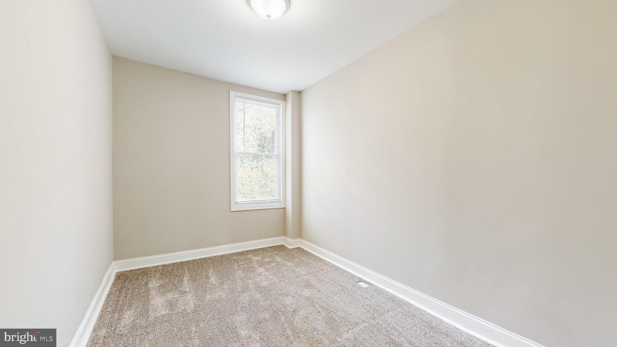 812 McCabe Avenue Baltimore, MD 21212 - Photo 17 of 18 an empty room with a window