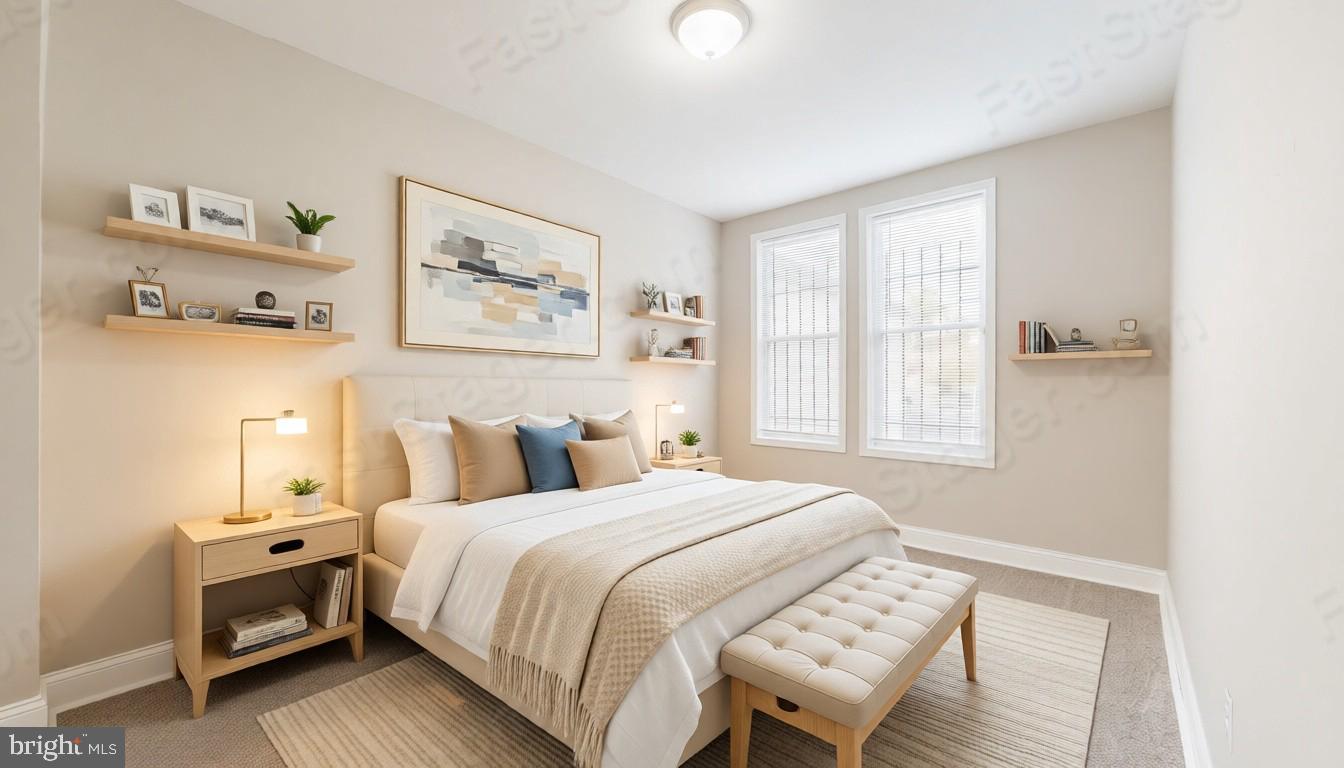 812 McCabe Avenue Baltimore, MD 21212 - Photo 7 of 18 a bedroom with a bed and a window