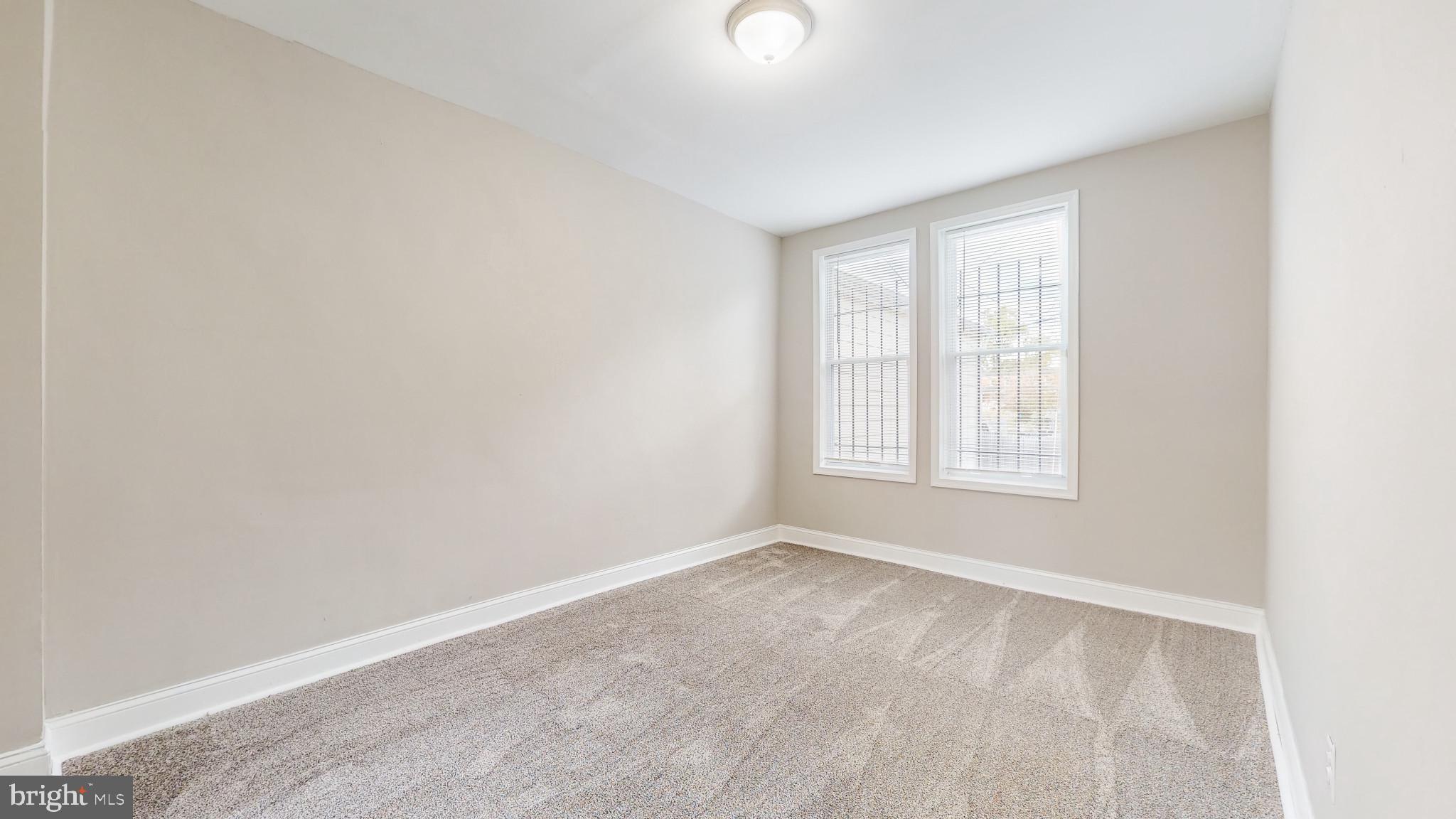 812 McCabe Avenue Baltimore, MD 21212 - Photo 8 of 18 an empty room with a window