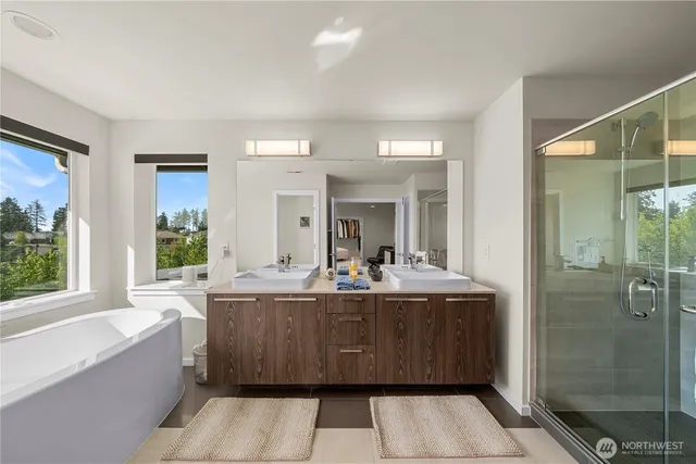 a bathroom with a bathtub and a sink