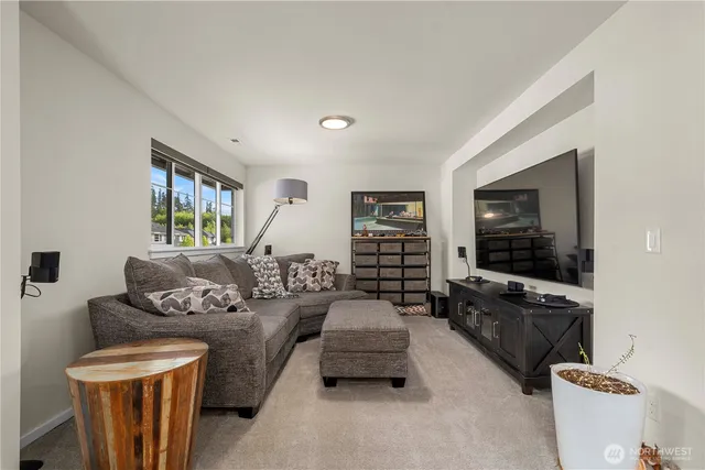 a room with furniture and a window