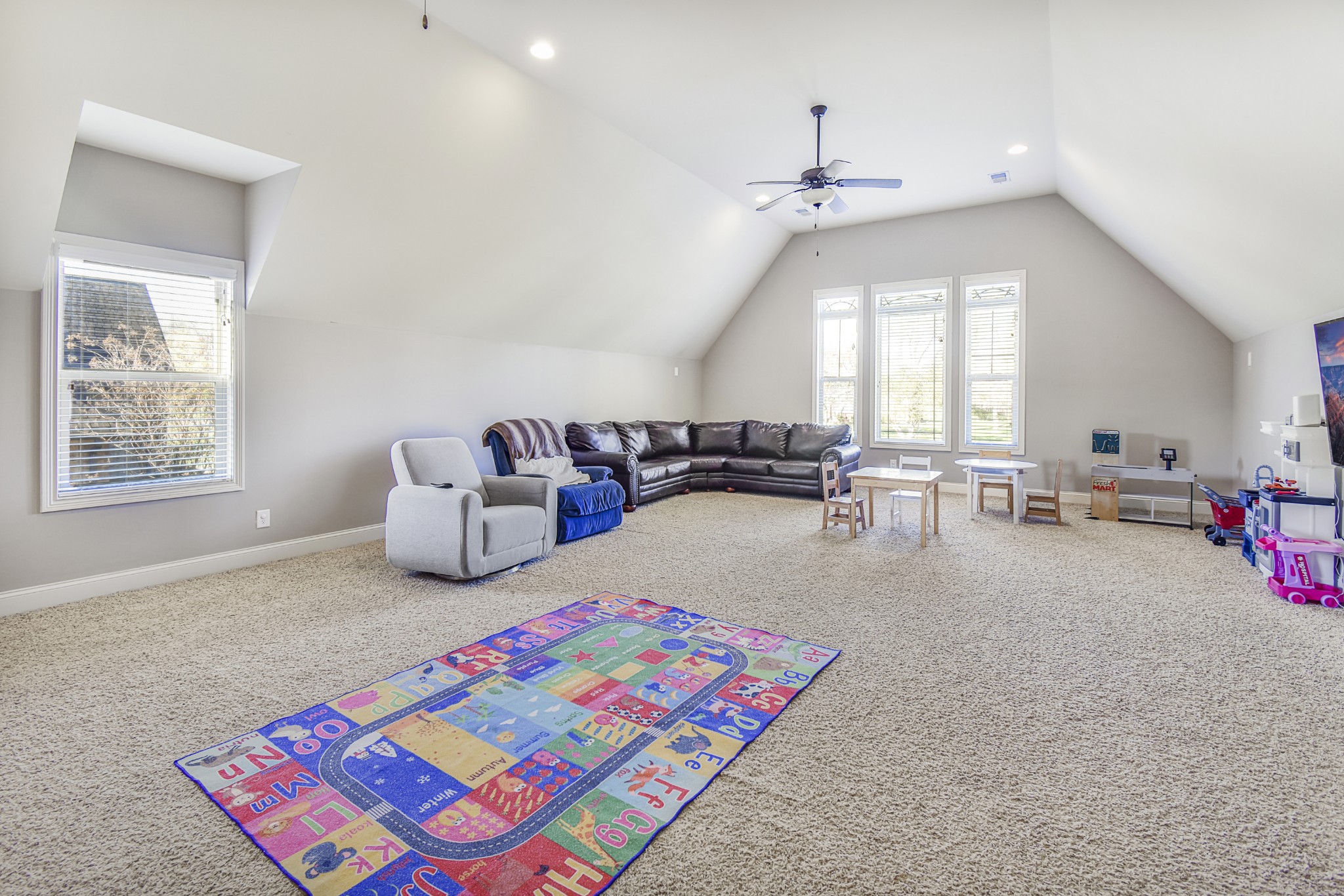 1133 Mires Road Mount Juliet, TN 37122 - Photo 30 of 51 a living room with furniture and a chandelier