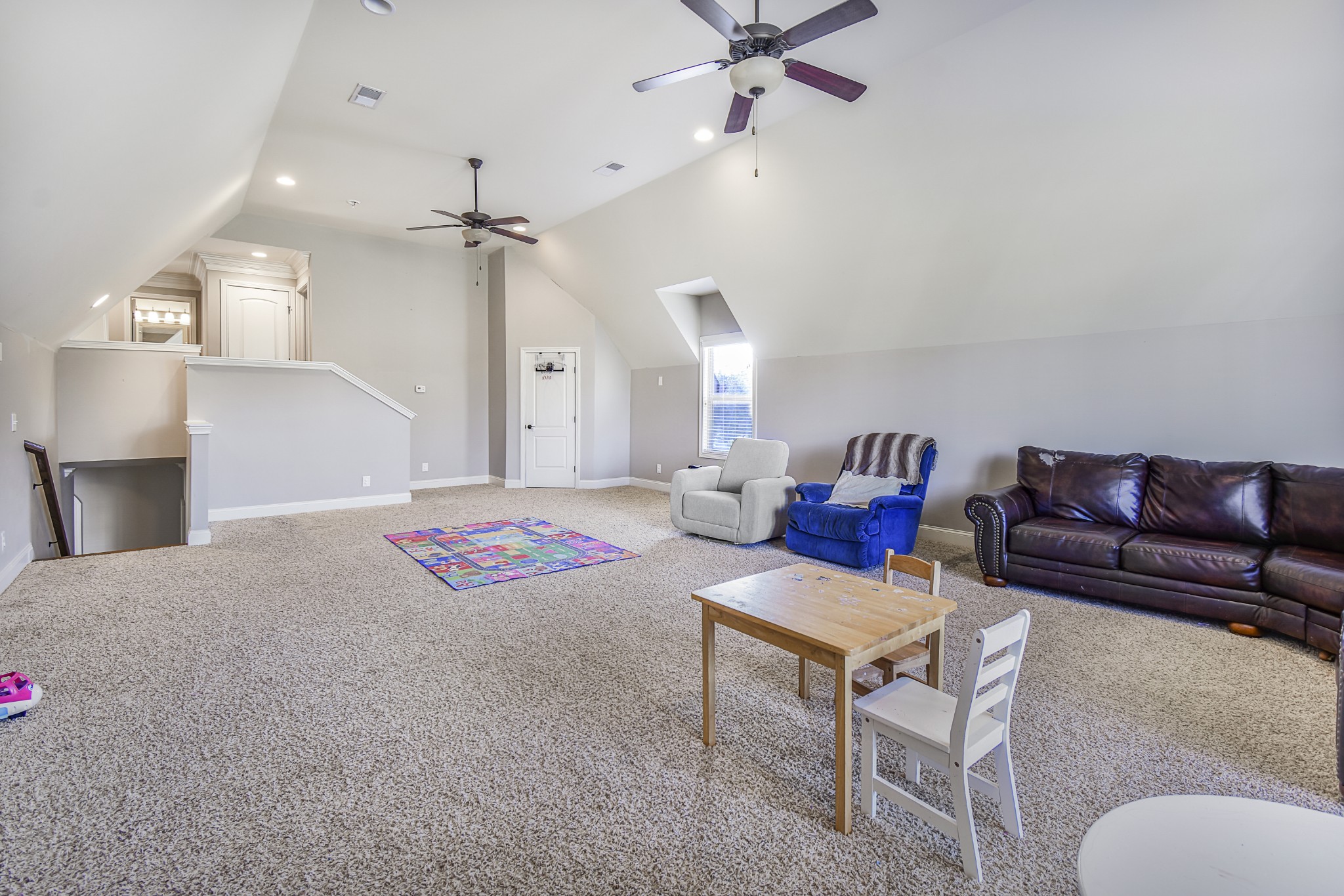 1133 Mires Road Mount Juliet, TN 37122 - Photo 31 of 51 a living room with furniture and a chandelier