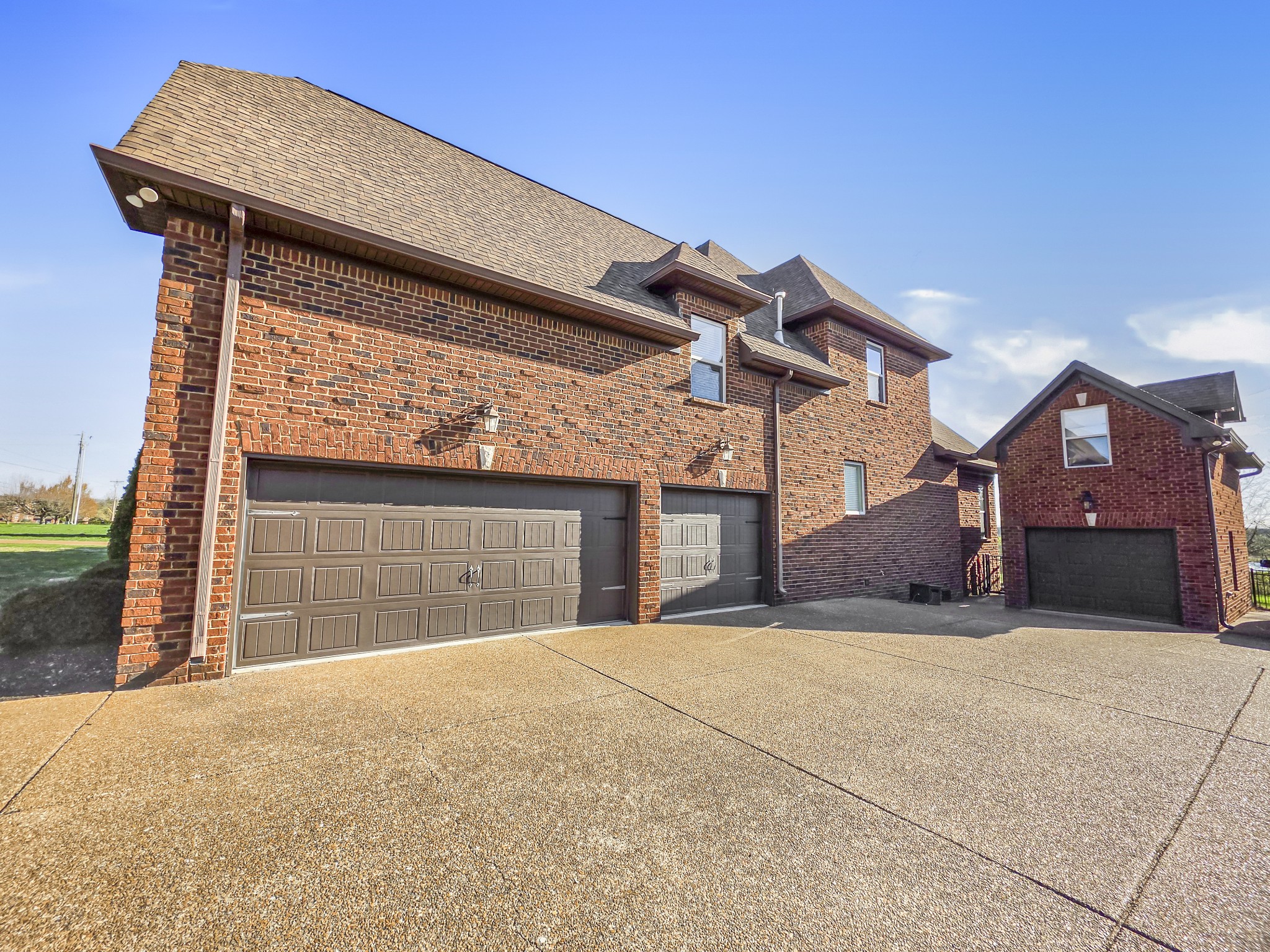 1133 Mires Road Mount Juliet, TN 37122 - Photo 40 of 51 a front view of a house with a yard and garage