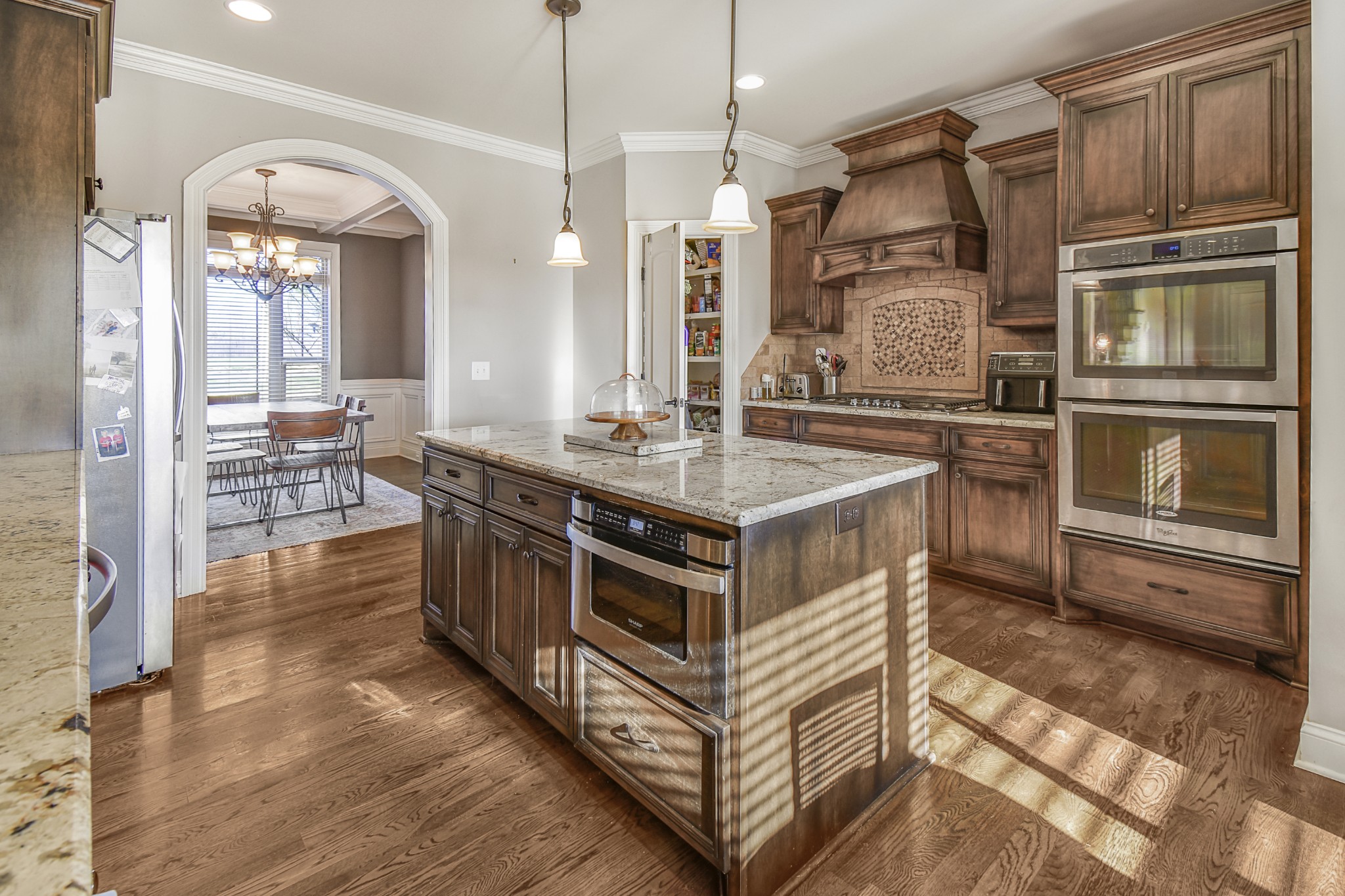 1133 Mires Road Mount Juliet, TN 37122 - Photo 8 of 51 a kitchen with stainless steel appliances a stove and a refrigerator