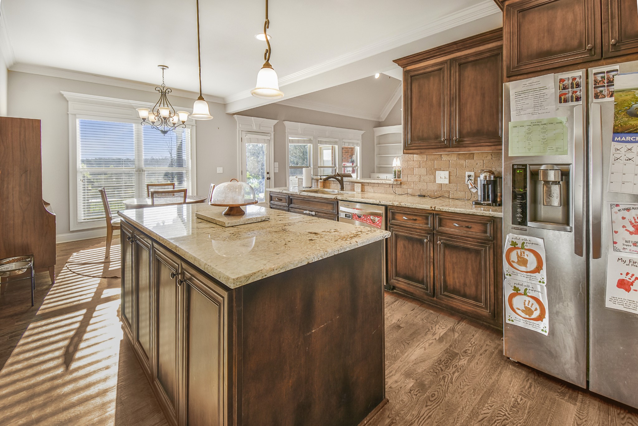 1133 Mires Road Mount Juliet, TN 37122 - Photo 10 of 51 a kitchen with stainless steel appliances granite countertop a sink a stove and a wooden floors