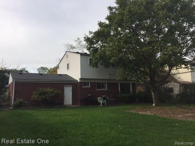 30072 Merrick Warren, MI 48092 - Photo 26 of 27 Mature tree for shade in backyard. Access from house to exterior door in garage.