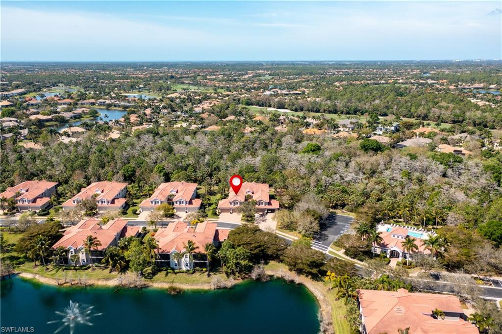 7837 Hawthorne Drive, Unit 1101 Naples, FL 34113 - Photo 23 of 26 an aerial view of a city with lots of residential buildings
