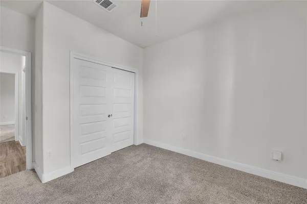 an empty room with closet