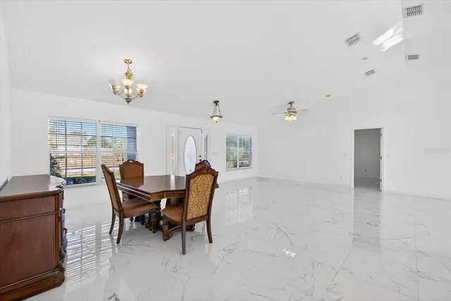a view of a dining room with furniture