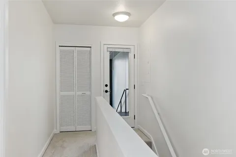 a spacious bedroom with a bed and a couch