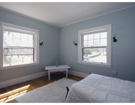 5 Edgehill Road Winchester, MA 01890 - Photo 16 of 28 a bedroom with bed and a window