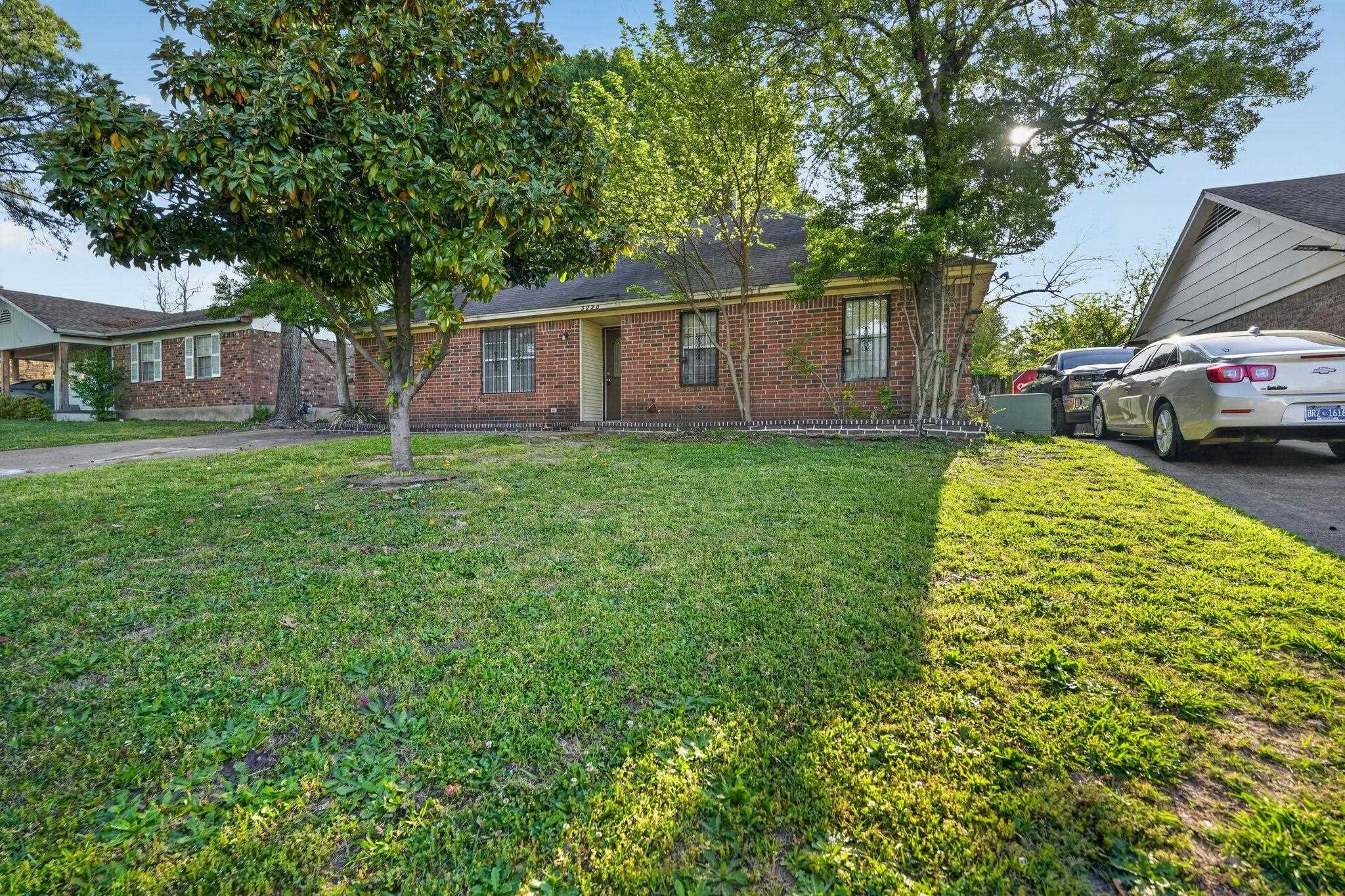 3820 Clarke Road Memphis, TN 38115 - Photo 1 of 30 Ranch-style home with brick siding and a front lawn